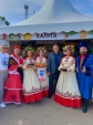Посетителей стенда Калуги на «Калужской осени» встретили купец с купчихой