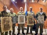 В Малоярославце участникам СВО вручили их портреты